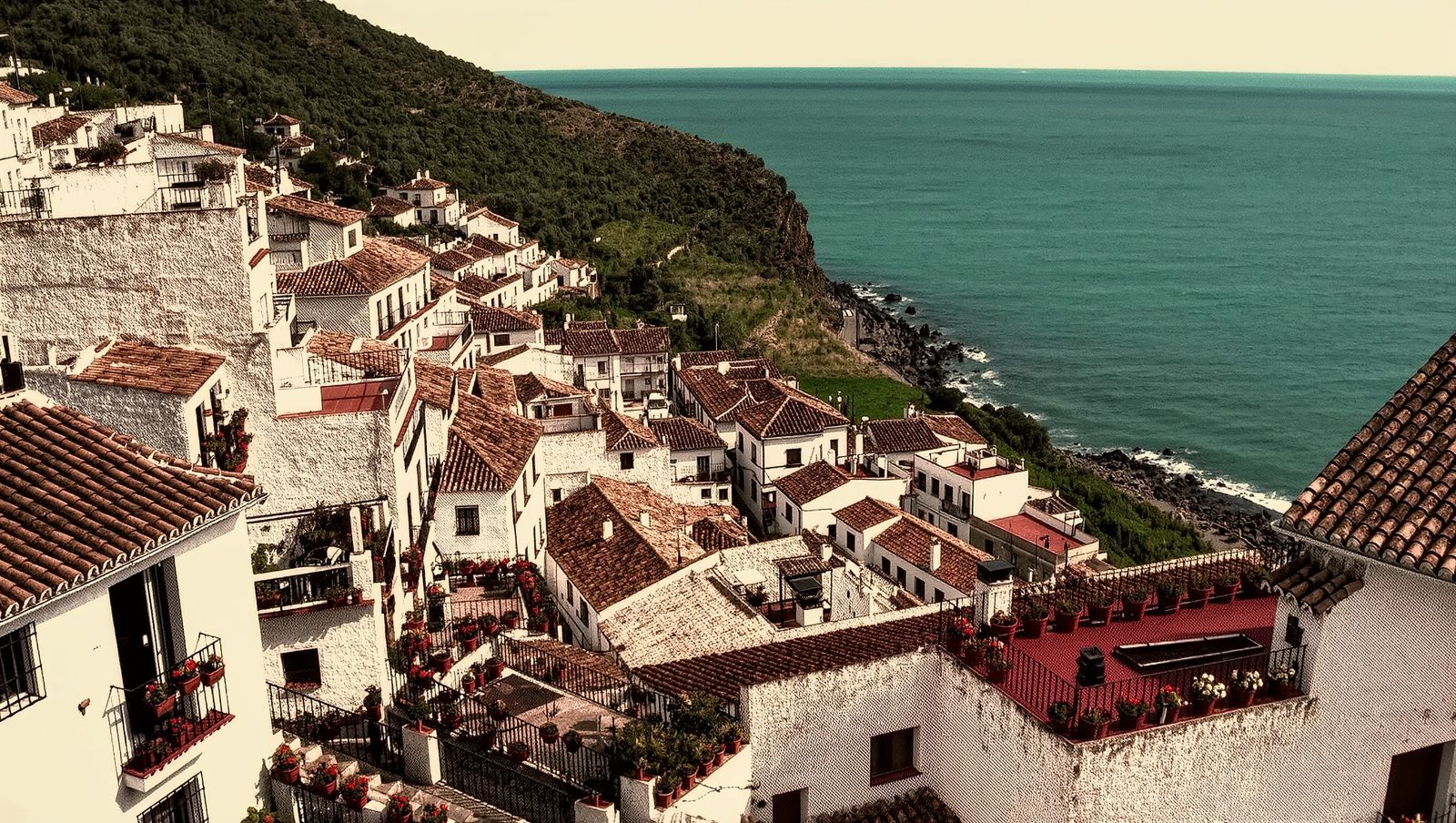 Ilustración del pueblo blanco de Frigiliana en Málaga con vistas al Mediterráneo